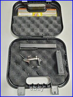 OEM Glock 23.40 cal Gen 3 complete slide, Lower parts kit, Magazine with case