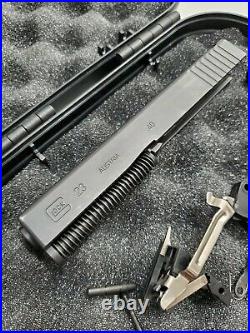 OEM Glock 23.40 cal Gen 3 complete slide, Lower parts kit, Magazine with case